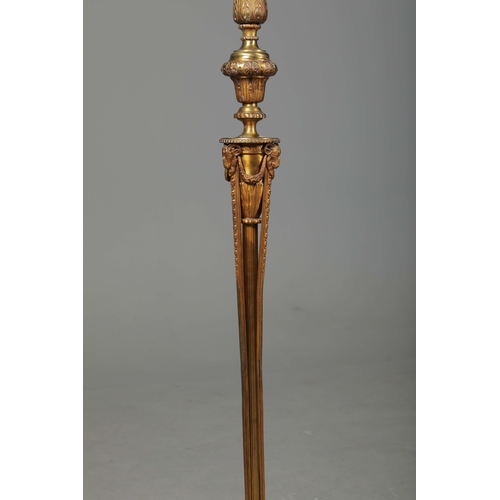 156 - BRASS STANDARD LAMP. with swag detail and three paw supports 155cm t.