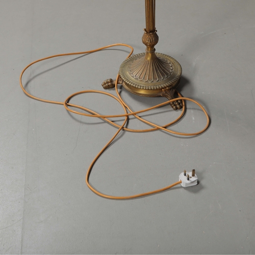 156 - BRASS STANDARD LAMP. with swag detail and three paw supports 155cm t.
