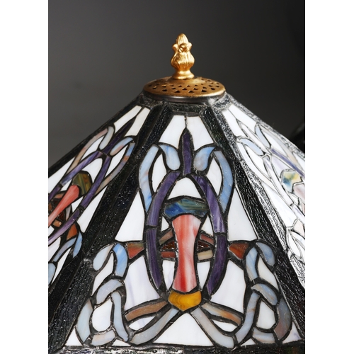 129 - TIFFANY STYLE TABLE LAMPS, A PAIR. each with hexagonal shades with a repeated symmetrical designs, r... 