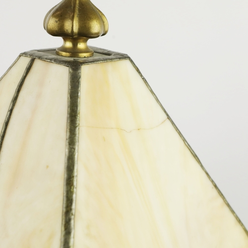 131 - TIFFANY STYLE TABLE LAMP. fitted with a four sided shade in cream and green, raised on a brass lamp ... 