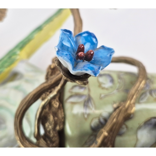 137 - PARROT WALL SCONCES, A PAIR. ceramic and gilt metal, floral detail, 65cm H approx. (2).