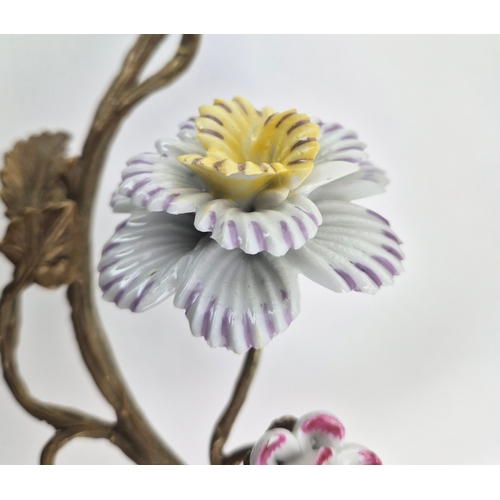 137 - PARROT WALL SCONCES, A PAIR. ceramic and gilt metal, floral detail, 65cm H approx. (2).