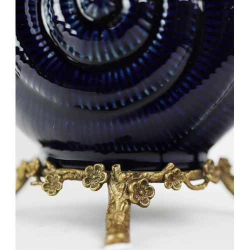 138 - CANDELABRA, A PAIR. in the form of birds amongst trees, shell form bases, ceramic and gilt metal, 65... 