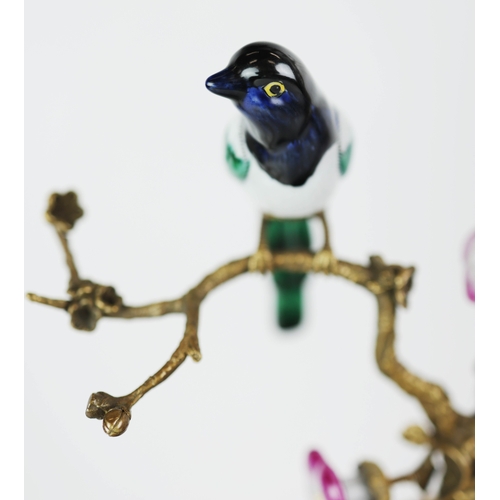 138 - CANDELABRA, A PAIR. in the form of birds amongst trees, shell form bases, ceramic and gilt metal, 65... 