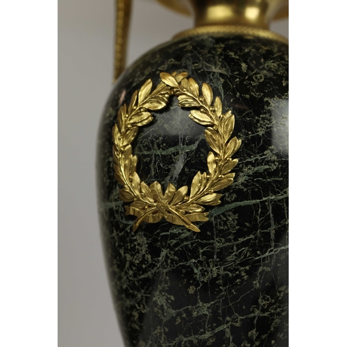 141 - A PAIR OF FRENCH GREEN VARIEGATED MARBLE EMPIRE LAMPS. (3). ormolu mounted with shades. Along with a... 