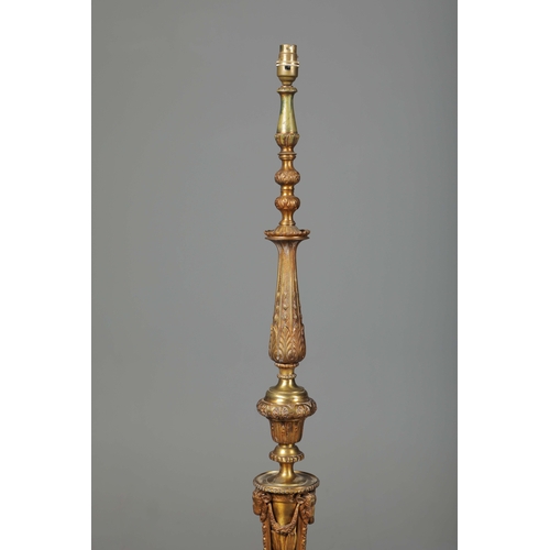 156 - BRASS STANDARD LAMP. with swag detail and three paw supports 155cm t.