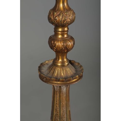 156 - BRASS STANDARD LAMP. with swag detail and three paw supports 155cm t.