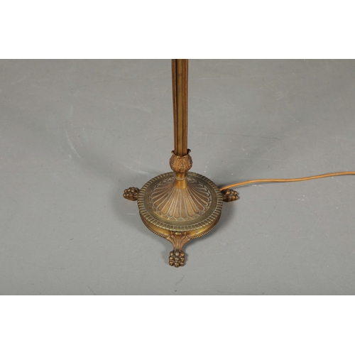 156 - BRASS STANDARD LAMP. with swag detail and three paw supports 155cm t.