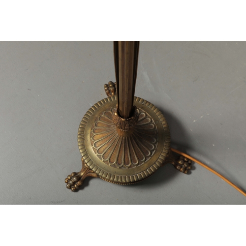 156 - BRASS STANDARD LAMP. with swag detail and three paw supports 155cm t.