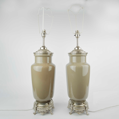 18 - BELLA FIGURA TABLE LAMPS, A PAIR. with differing shade carriers, 58cm H each not including shade car... 