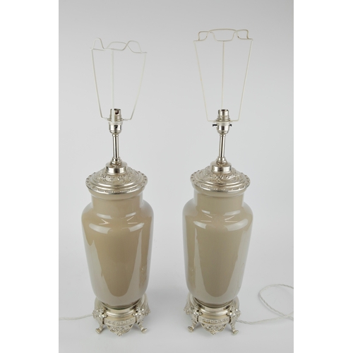 18 - BELLA FIGURA TABLE LAMPS, A PAIR. with differing shade carriers, 58cm H each not including shade car... 