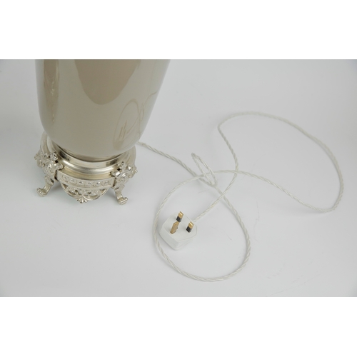 18 - BELLA FIGURA TABLE LAMPS, A PAIR. with differing shade carriers, 58cm H each not including shade car... 