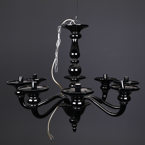 186 - BLACK GLASS CHANDELIER. 8 branch, 65cm drop approx. not including any chain or fittings.