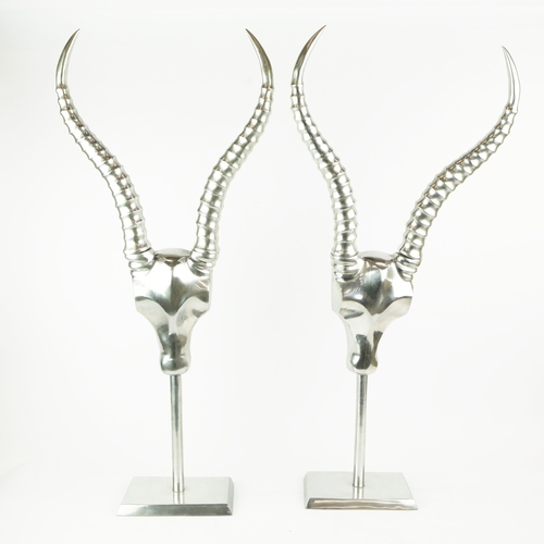 188 - PAIR OF ANDREW MARTIN POLISHED METAL ANTELOPE HEAD SCULPTURES. 84cm H x 38cm W x 13cm D.