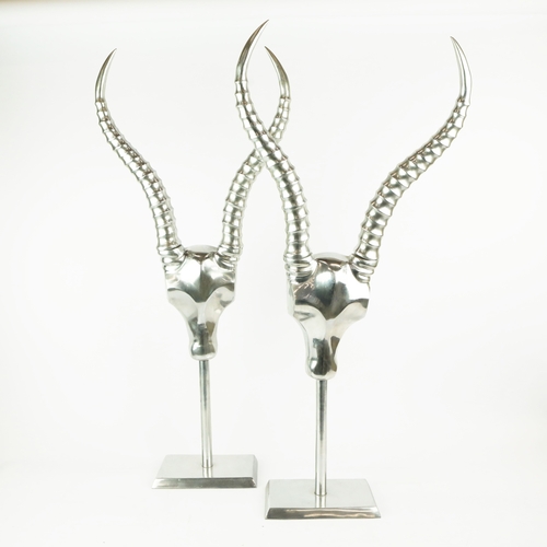 188 - PAIR OF ANDREW MARTIN POLISHED METAL ANTELOPE HEAD SCULPTURES. 84cm H x 38cm W x 13cm D.