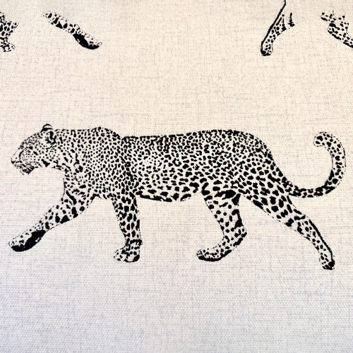 192 - LOW FOOTSTOOL IN LEOPARD PRINT UPHOLSTERY ON TURNED SUPPORTS. 38cm H x 100cm W x 50cm D.