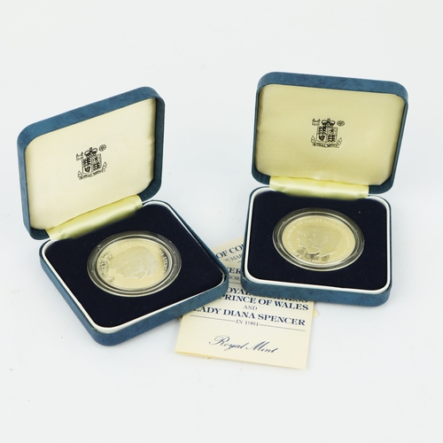 198 - TWO SILVER PROOF COMMEMORATIVE ROYAL WEDDING PRINCE OF WALES AND LADY DIANA SPENCER BOXED COINS. (9)... 