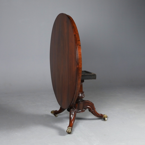 209 - BREAKFAST TABLE. Victorian rosewood, the circular top on a carved and turned column with triform sup... 