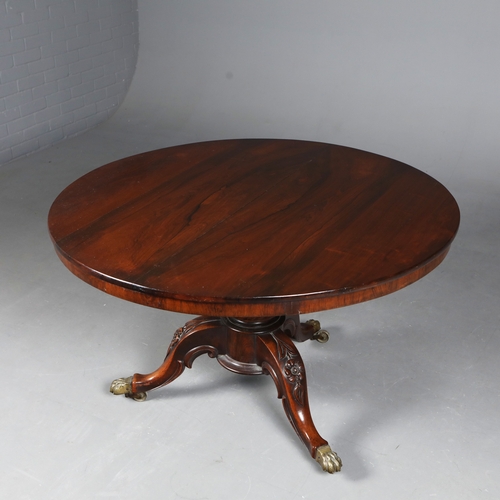 209 - BREAKFAST TABLE. Victorian rosewood, the circular top on a carved and turned column with triform sup... 