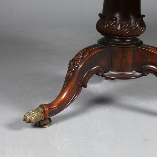 209 - BREAKFAST TABLE. Victorian rosewood, the circular top on a carved and turned column with triform sup... 