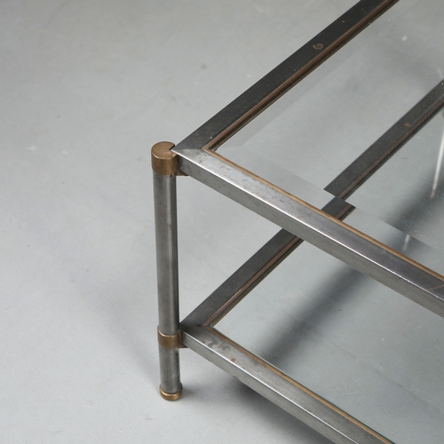 217 - COFFEE TABLE. the bevelled glass top on a metal base with brass trim over an under tier 41 cm t x 12... 
