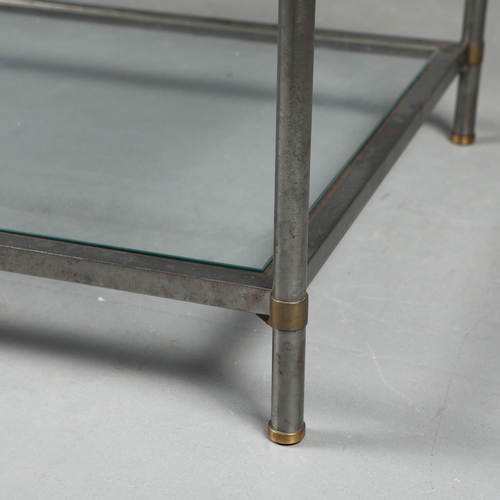 217 - COFFEE TABLE. the bevelled glass top on a metal base with brass trim over an under tier 41 cm t x 12... 