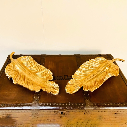 222 - PAIR OF GILT METAL TROPICAL LEAF SERVING DISHES. 7cm H x 50cm W x 20cm D.