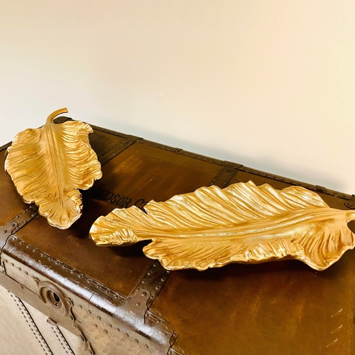 222 - PAIR OF GILT METAL TROPICAL LEAF SERVING DISHES. 7cm H x 50cm W x 20cm D.