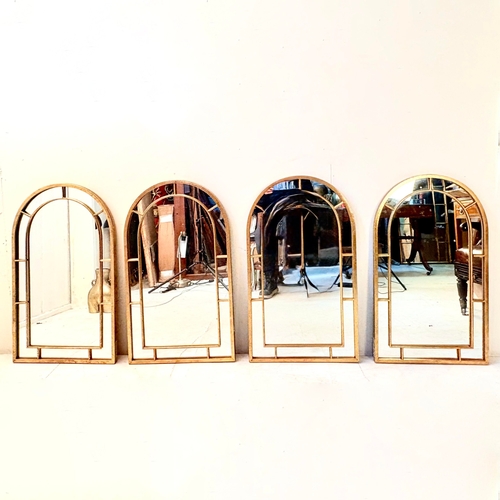 235 - SET OF FOUR ARCHED WALL MIRRORS WITH GILT METAL FRAMES. 82cm H x 49cm W.
