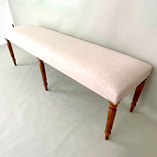 241 - HALL BENCH IN NEUTRAL LINEN UPHOLSTERY ON REEDED SUPPORTS. 48cm H x 150cm W x 40cm D.