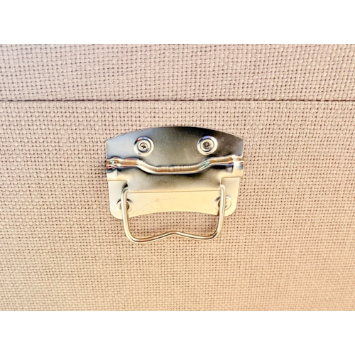 246 - GRADUATED SET OF THREE LUGGAGE STYLE TRUNKS IN LINEN. Largest 50cm H x 50cm W x 50cm D.