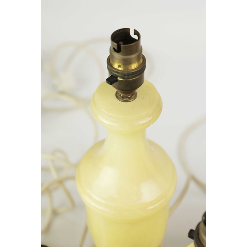 254 - TEN OYNX TABLE LAMPS. of various sizes, largest 39cm t, no shades, some with round plugs (10).
