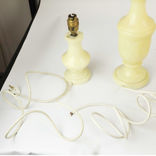 254 - TEN OYNX TABLE LAMPS. of various sizes, largest 39cm t, no shades, some with round plugs (10).