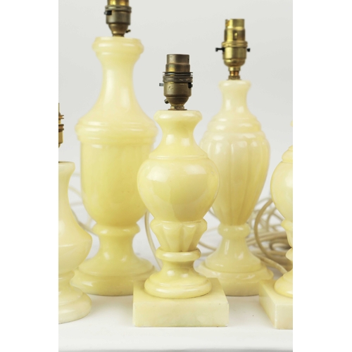 254 - TEN OYNX TABLE LAMPS. of various sizes, largest 39cm t, no shades, some with round plugs (10).