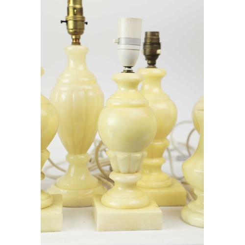 254 - TEN OYNX TABLE LAMPS. of various sizes, largest 39cm t, no shades, some with round plugs (10).