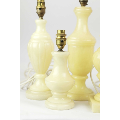 254 - TEN OYNX TABLE LAMPS. of various sizes, largest 39cm t, no shades, some with round plugs (10).