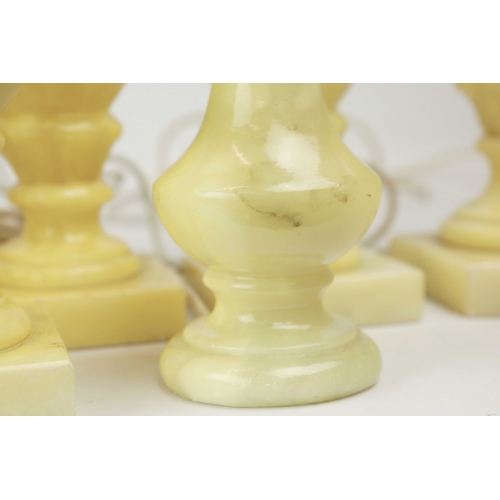 254 - TEN OYNX TABLE LAMPS. of various sizes, largest 39cm t, no shades, some with round plugs (10).