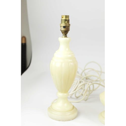 254 - TEN OYNX TABLE LAMPS. of various sizes, largest 39cm t, no shades, some with round plugs (10).