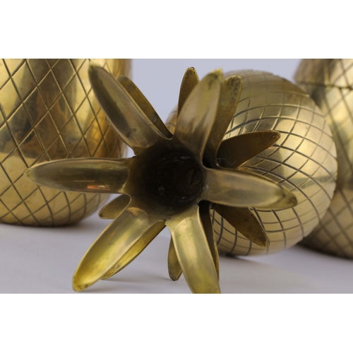 255 - PAIR OF GILT METAL PINEAPPLE JARS. 25cm H x 12cm W x 12cm D.