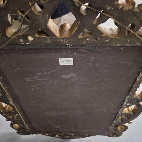 258 - A BAROQUE STYLE RECTANGULAR WALL MIRROR. elaborately moulded and gilded frame, with a large scrollin... 