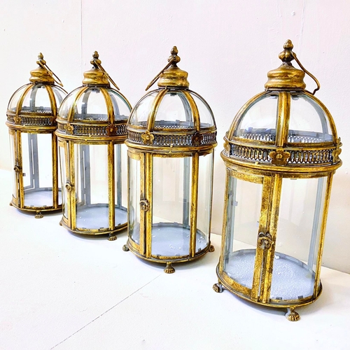 261 - SET OF FOUR REGENCY STYLE GILT METAL AND GLASS CANDLE LANTERNS. 46cm H x 20cm W x 20cm D.
