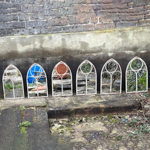 267 - SET OF SIX ARCHITECTURAL GARDEN MIRRORS WITH ARCHED METAL FRAMES. 42cm H x 25cm W.