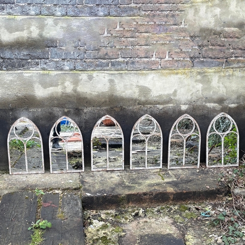 267 - SET OF SIX ARCHITECTURAL GARDEN MIRRORS WITH ARCHED METAL FRAMES. 42cm H x 25cm W.