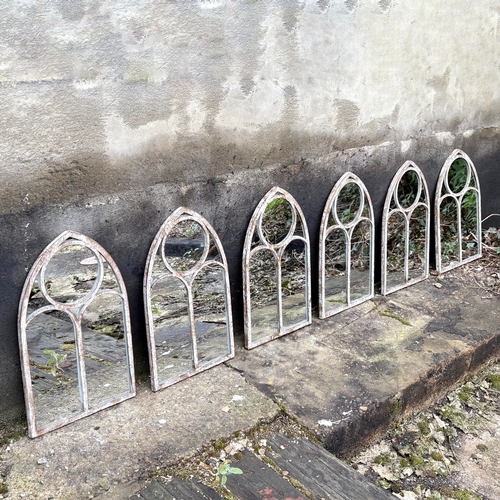 267 - SET OF SIX ARCHITECTURAL GARDEN MIRRORS WITH ARCHED METAL FRAMES. 42cm H x 25cm W.
