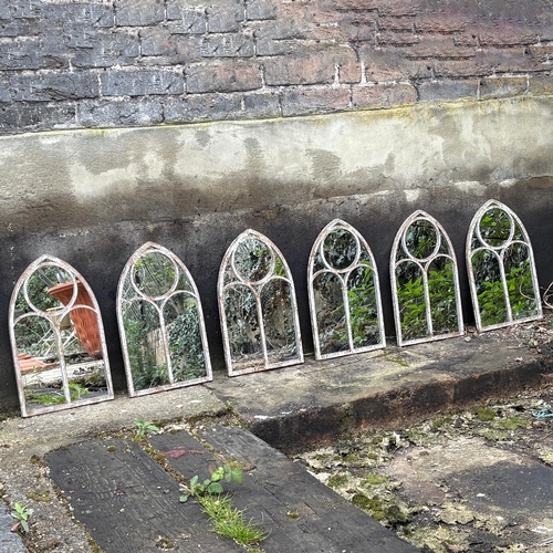 267 - SET OF SIX ARCHITECTURAL GARDEN MIRRORS WITH ARCHED METAL FRAMES. 42cm H x 25cm W.