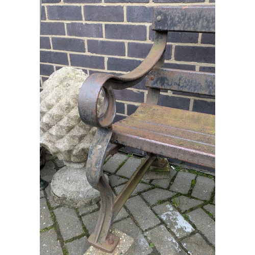 268 - EARLY/MID 20TH CENTURY CAST IRON GARDEN BENCH. 71cm H x 183cm W x 62cm D.