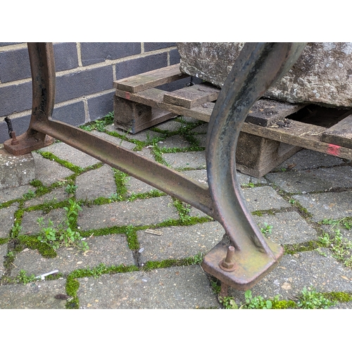 268 - EARLY/MID 20TH CENTURY CAST IRON GARDEN BENCH. 71cm H x 183cm W x 62cm D.