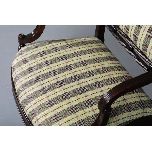 269 - GEORGIAN STYLE MAHOGANY OPEN ARMCHAIR. With a checked seat, reeded supports and shaped cross stretch... 