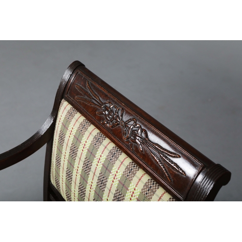 269 - GEORGIAN STYLE MAHOGANY OPEN ARMCHAIR. With a checked seat, reeded supports and shaped cross stretch... 