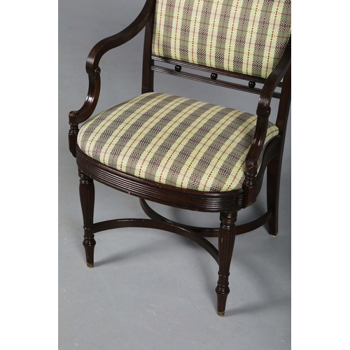 269 - GEORGIAN STYLE MAHOGANY OPEN ARMCHAIR. With a checked seat, reeded supports and shaped cross stretch... 